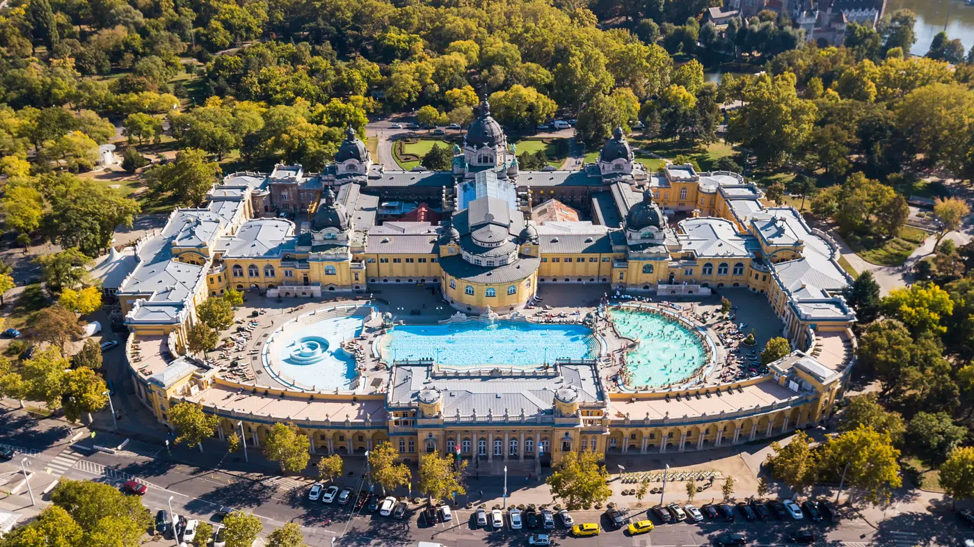 Aerial view of a grand thermal resort and outdoor swimming pools