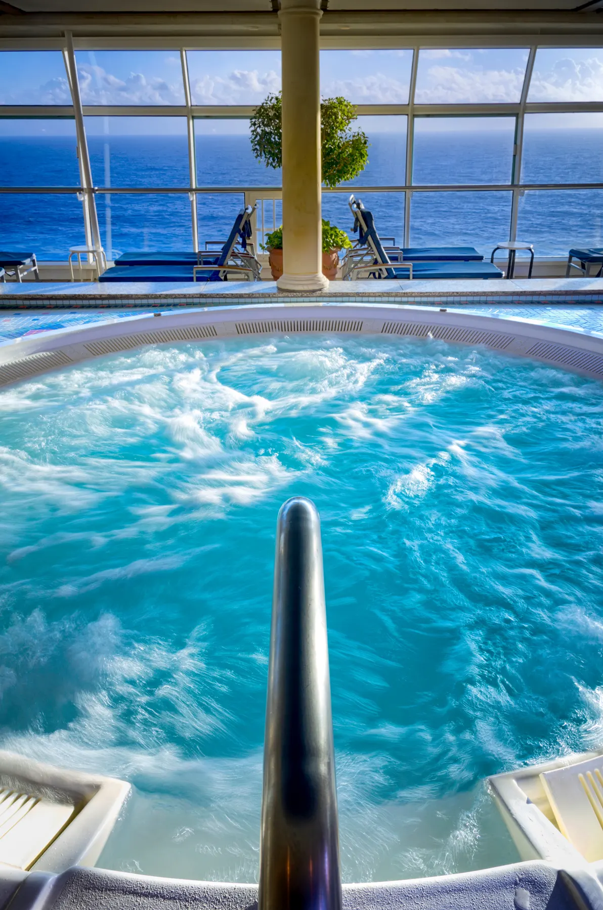 Crystal-clear bubbling hydrotherapy pool water