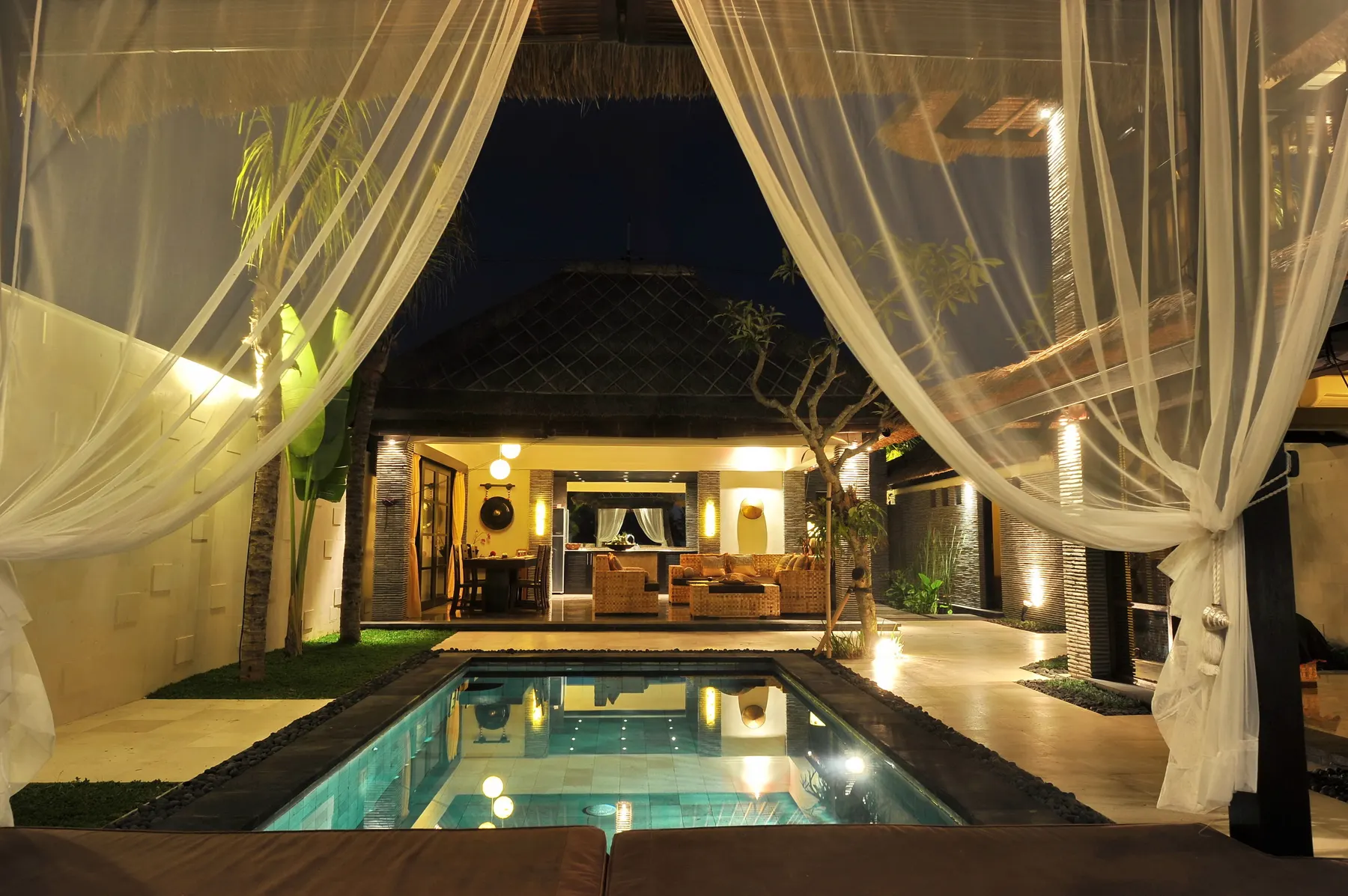 Guests enjoying wellness pool at luxury resort